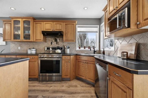 951 3Rd Street Sw, Diamond Valley, AB - Indoor Photo Showing Kitchen With Stainless Steel Kitchen