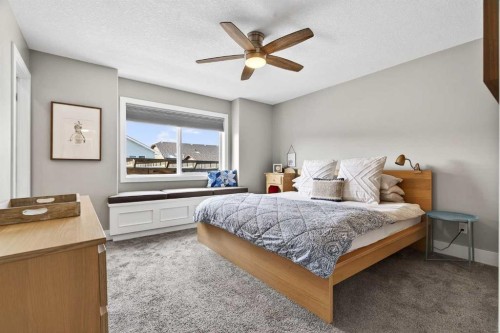 951 3Rd Street Sw, Diamond Valley, AB - Indoor Photo Showing Bedroom