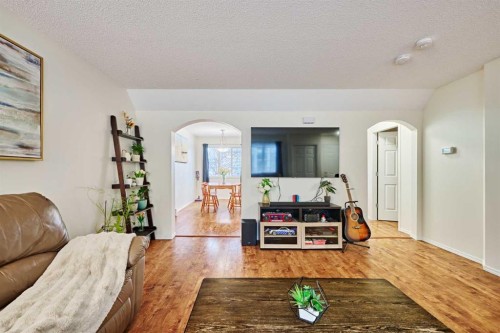 2366 Eversyde Avenue Sw, Calgary, AB - Indoor Photo Showing Living Room