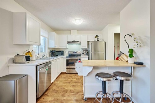 2366 Eversyde Avenue Sw, Calgary, AB - Indoor Photo Showing Kitchen