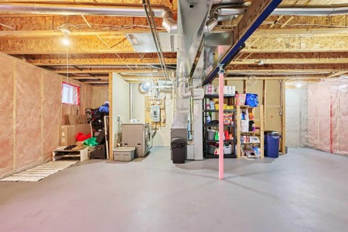 2366 Eversyde Avenue Sw, Calgary, AB - Indoor Photo Showing Basement