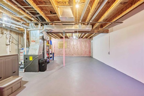 2366 Eversyde Avenue Sw, Calgary, AB - Indoor Photo Showing Basement