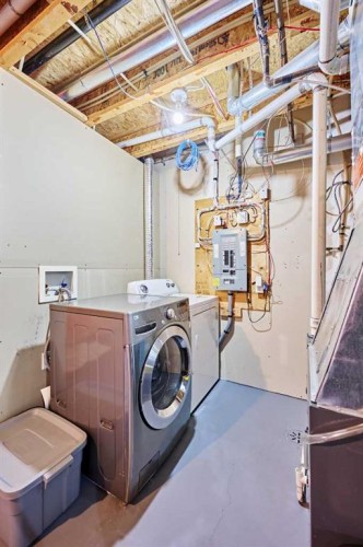 2366 Eversyde Avenue Sw, Calgary, AB - Indoor Photo Showing Laundry Room