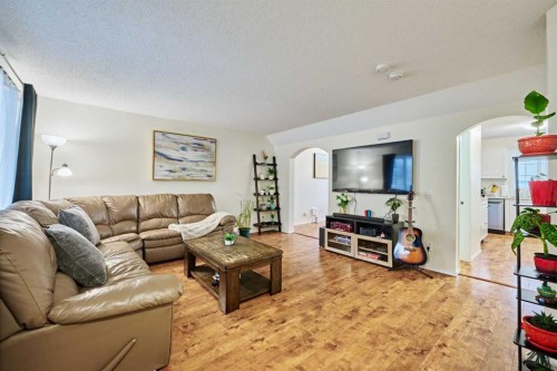 2366 Eversyde Avenue Sw, Calgary, AB - Indoor Photo Showing Living Room