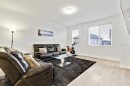 620 Copperstone Manor Se, Calgary, AB  - Indoor Photo Showing Living Room 