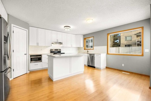 36 Arbour Wood Crescent Nw, Calgary, AB - Indoor Photo Showing Kitchen With Stainless Steel Kitchen