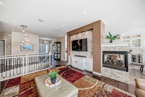 58 Chapala Crescent Se, Calgary, AB - Indoor Photo Showing Living Room With Fireplace