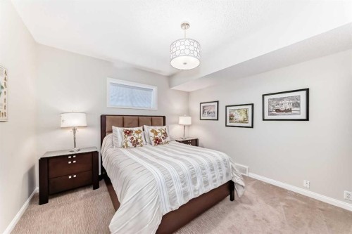 58 Chapala Crescent Se, Calgary, AB - Indoor Photo Showing Bedroom
