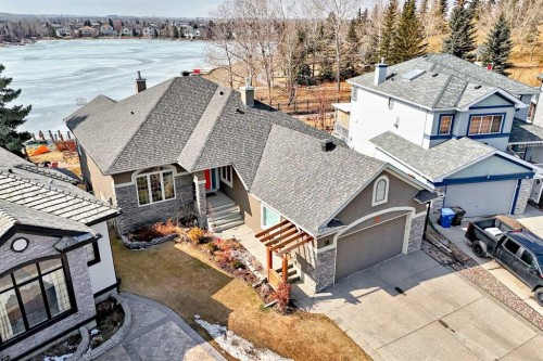58 Chapala Crescent Se, Calgary, AB - Outdoor With Body Of Water