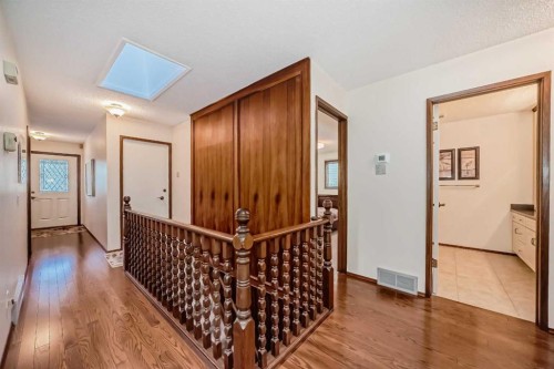 111 Oakside Road Sw, Calgary, AB - Indoor Photo Showing Other Room