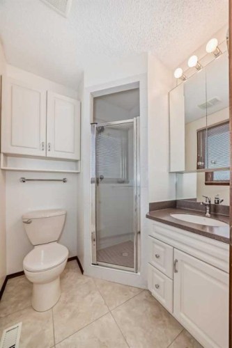 111 Oakside Road Sw, Calgary, AB - Indoor Photo Showing Bathroom