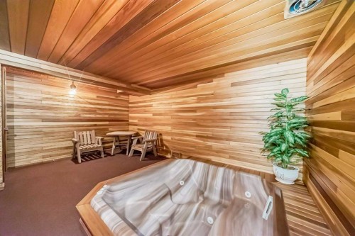 111 Oakside Road Sw, Calgary, AB - Indoor Photo Showing Other Room