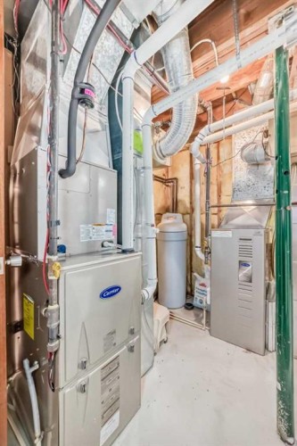 111 Oakside Road Sw, Calgary, AB - Indoor Photo Showing Basement