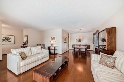 111 Oakside Road Sw, Calgary, AB - Indoor Photo Showing Living Room