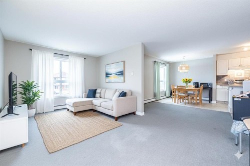 304-5555 Falsbridge Drive Ne, Calgary, AB - Indoor Photo Showing Living Room