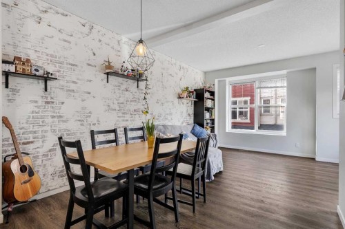 149 New Brighton Point Se, Calgary, AB - Indoor Photo Showing Dining Room