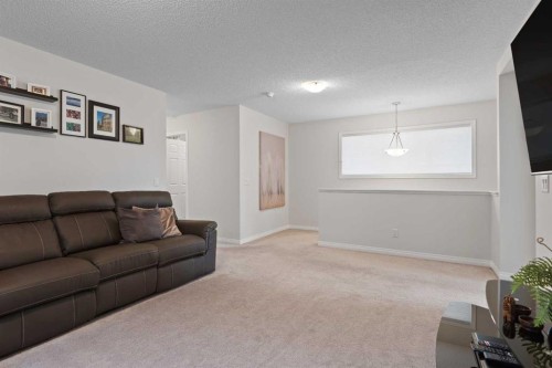 169 Buckskin Way, Cochrane, AB - Indoor Photo Showing Living Room