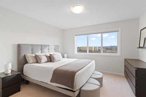 169 Buckskin Way, Cochrane, AB - Indoor Photo Showing Bedroom