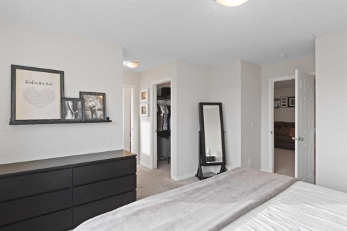 169 Buckskin Way, Cochrane, AB - Indoor Photo Showing Bedroom