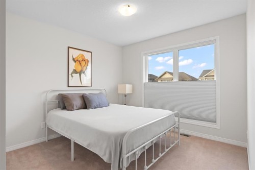 169 Buckskin Way, Cochrane, AB - Indoor Photo Showing Bedroom