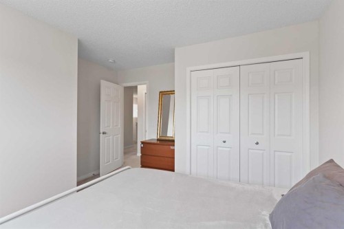 169 Buckskin Way, Cochrane, AB - Indoor Photo Showing Bedroom