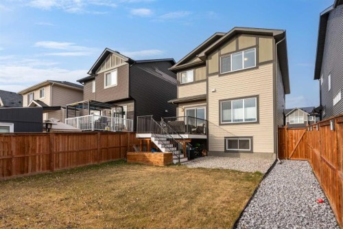 169 Buckskin Way, Cochrane, AB - Outdoor With Deck Patio Veranda With Exterior