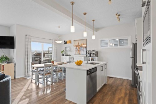 169 Buckskin Way, Cochrane, AB - Indoor Photo Showing Kitchen With Upgraded Kitchen