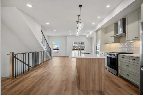 8341 8 Avenue Sw, Calgary, AB - Indoor Photo Showing Kitchen With Upgraded Kitchen