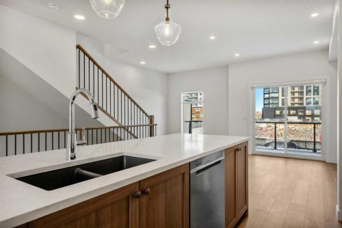 8341 8 Avenue Sw, Calgary, AB - Indoor Photo Showing Kitchen With Double Sink