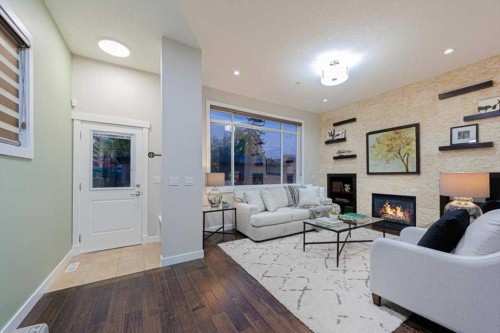 462 23 Avenue Nw, Calgary, AB - Indoor Photo Showing Living Room With Fireplace