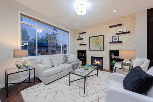 462 23 Avenue Nw, Calgary, AB - Indoor Photo Showing Living Room With Fireplace