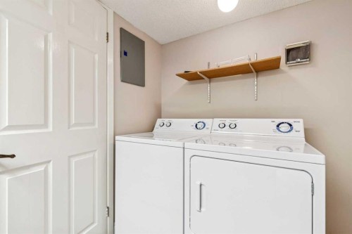 105-2425 90 Avenue Sw, Calgary, AB - Indoor Photo Showing Laundry Room