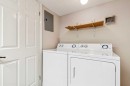 105-2425 90 Avenue Sw, Calgary, AB  - Indoor Photo Showing Laundry Room 