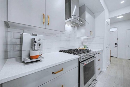 250 Hotchkiss Common Se, Calgary, AB - Indoor Photo Showing Kitchen With Upgraded Kitchen