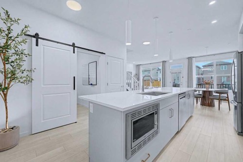 250 Hotchkiss Common Se, Calgary, AB - Indoor Photo Showing Kitchen With Upgraded Kitchen