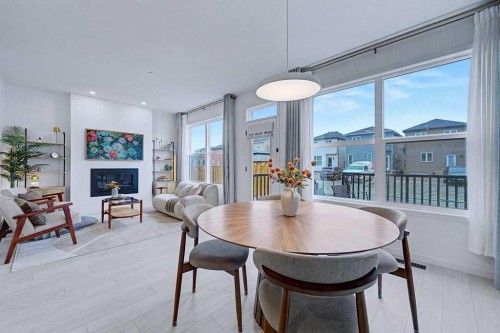 250 Hotchkiss Common Se, Calgary, AB - Indoor With Fireplace