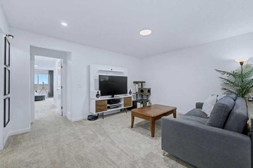 250 Hotchkiss Common Se, Calgary, AB - Indoor Photo Showing Living Room