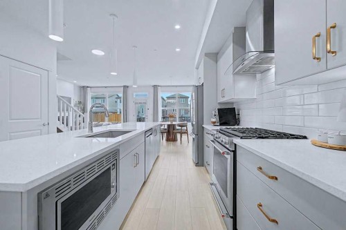 250 Hotchkiss Common Se, Calgary, AB - Indoor Photo Showing Kitchen With Upgraded Kitchen
