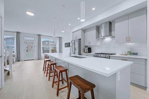 250 Hotchkiss Common Se, Calgary, AB - Indoor Photo Showing Kitchen With Upgraded Kitchen