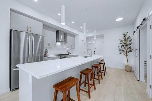 250 Hotchkiss Common Se, Calgary, AB - Indoor Photo Showing Kitchen With Upgraded Kitchen