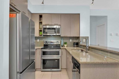 3115-175 Silverado Boulevard Sw, Calgary, AB - Indoor Photo Showing Kitchen With Stainless Steel Kitchen With Double Sink