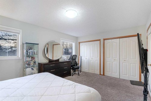 13 Mt. Aberdeen Manor Se, Calgary, AB - Indoor Photo Showing Bedroom