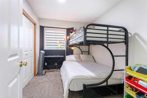 13 Mt. Aberdeen Manor Se, Calgary, AB - Indoor Photo Showing Bedroom