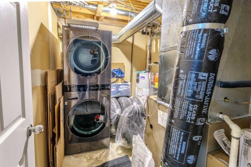 13 Mt. Aberdeen Manor Se, Calgary, AB - Indoor Photo Showing Laundry Room
