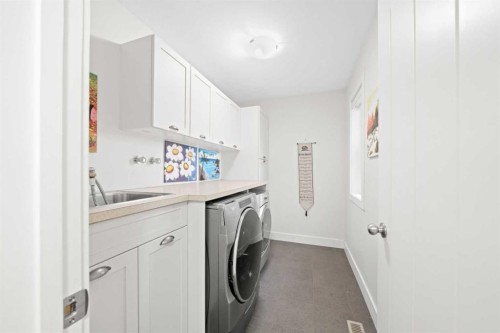115 Mahogany Way Se, Calgary, AB - Indoor Photo Showing Laundry Room