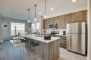 408-660 Shawnee Square Sw, Calgary, AB  - Indoor Photo Showing Kitchen With Stainless Steel Kitchen With Double Sink With Upgraded Kitchen 