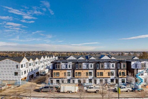 408-660 Shawnee Square Sw, Calgary, AB - Outdoor With Facade