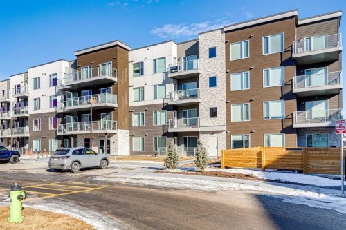 408-660 Shawnee Square Sw, Calgary, AB - Outdoor With Balcony With Facade