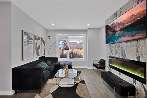 34 Cornerstone Road Ne, Calgary, AB - Indoor Photo Showing Living Room With Fireplace