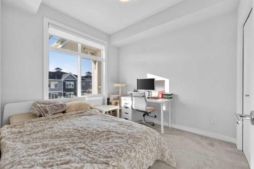 402-500 Auburn Meadows Common Se, Calgary, AB - Indoor Photo Showing Bedroom
